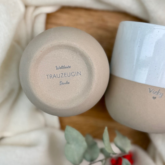 Personalized two-tone stoneware mug with 'Vicky' engraving and a hidden 'Maid of Honor' surprise message on the bottom.